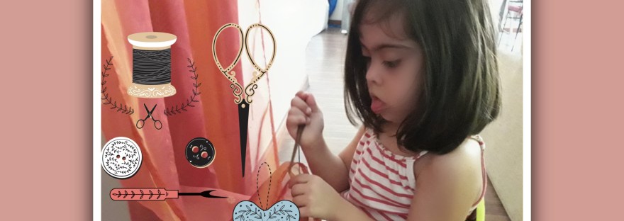 imagen de niña con sindrome de down cosiendo